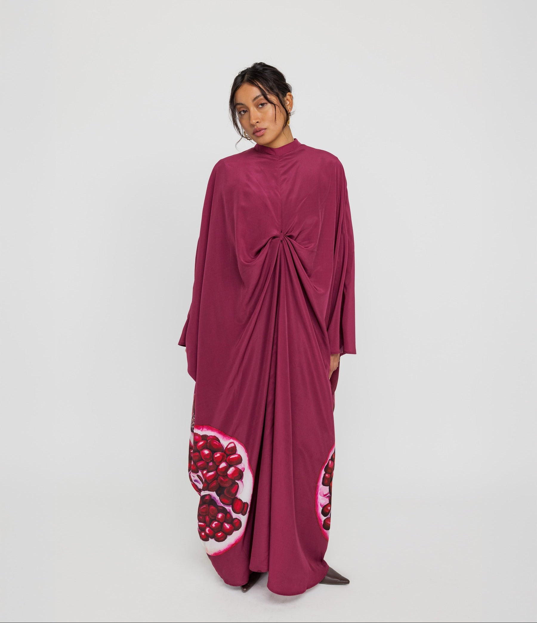Statement kaftan with elegant draping and a heritage-inspired design for special occasions
