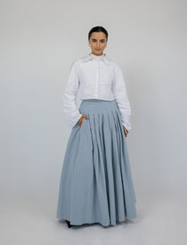 Pleated cotton skirt with a clean finish and full silhouette, made for comfort and flow