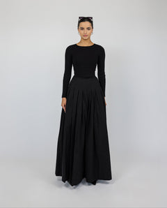 Full-length cotton skirt with defined pleats and a graceful, floaty feel.