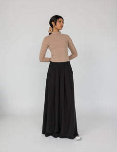 Full-coverage pants with wide legs and a polished, effortless look