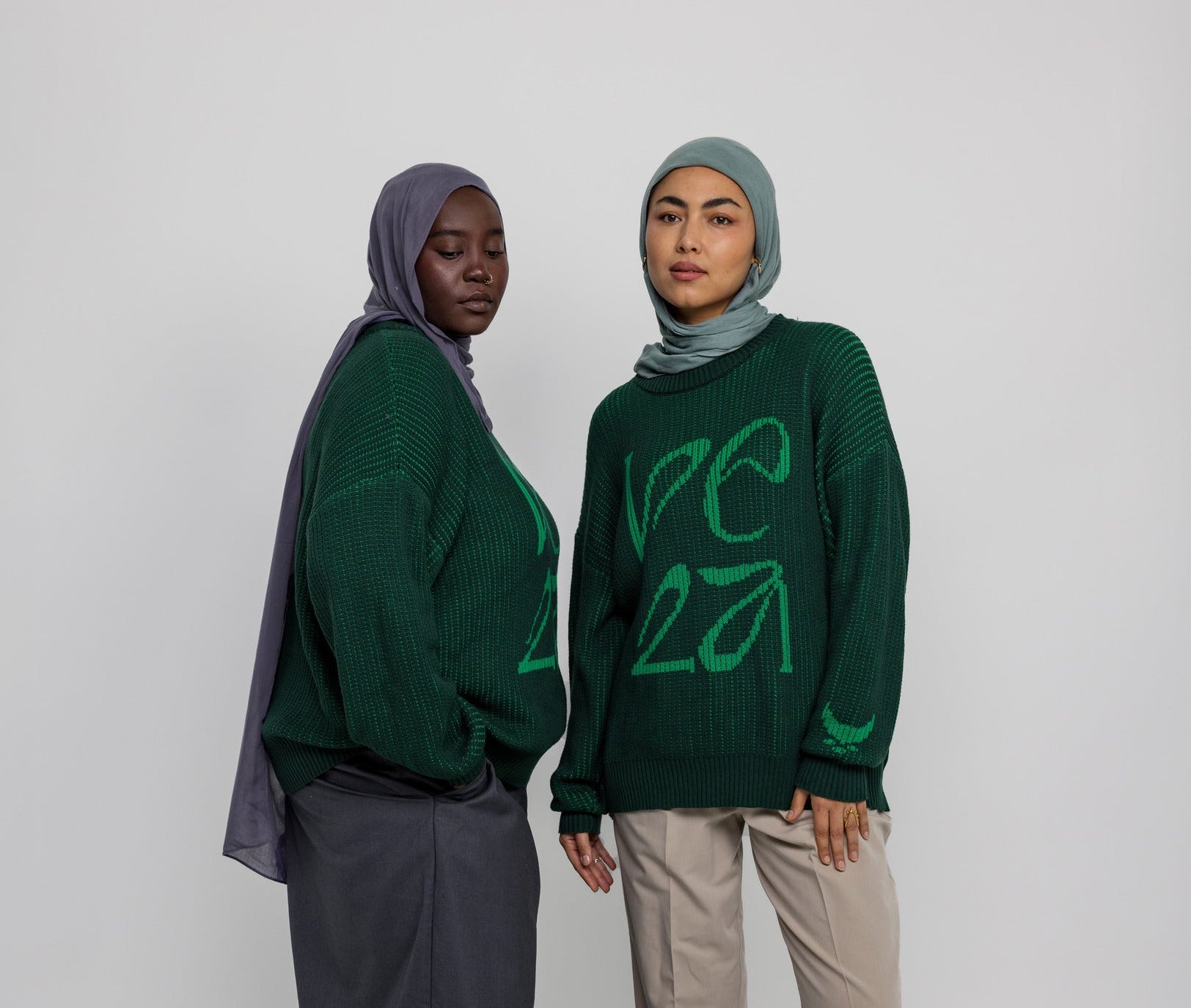 Soft oversized sweater with traditional pattern influence and modern comfort.