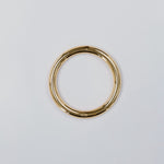 Gold hoop on a light gray background