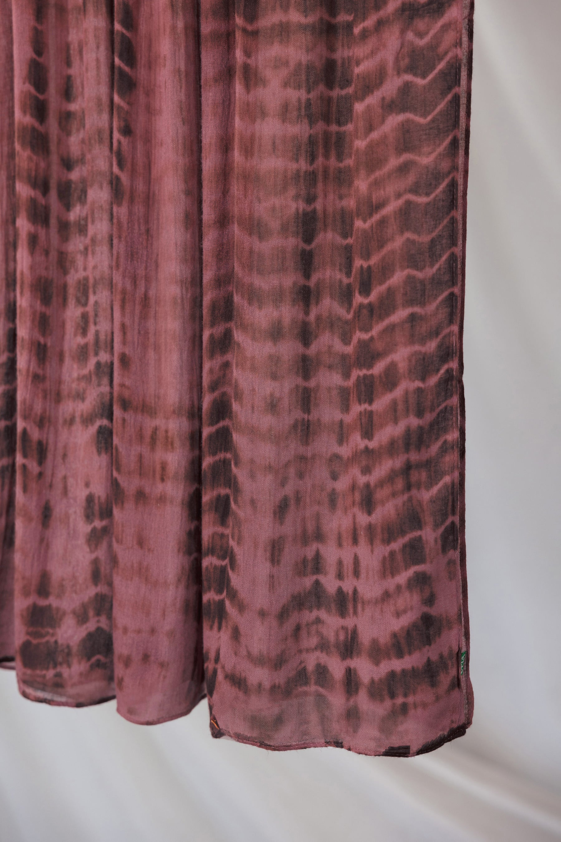 Close up of red clay ripple print hijab 