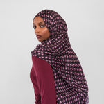 Woman wearing cocoa eclipse hijab on white background