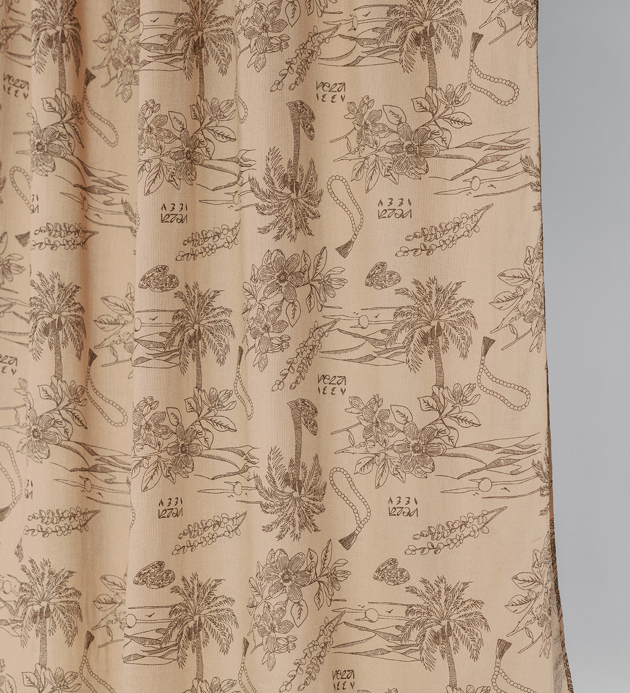Textile with floral pattern on a beige background