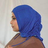 Model wearing Ocean Blue Ruching Lite, displaying the ruching detail. 