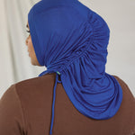 Ocean Blue Ruching Lite shown on model from back view. 
