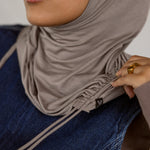 Model wearing Truffle Mink Ruching Lite, highlighting ruching near the edge and soft, lightweight fabric.