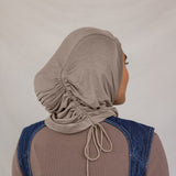 Model showing the Truffle Mink Ruching Lite hijab from the back to show the detail.