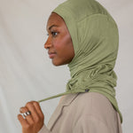 Model wearing Palm Desert Ruching Lite, showing ruching texture and breathable, wrinkle-free fabric.