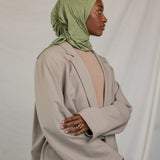 Model wearing Palm Desert Ruching showcasing its versatile styling ability. 