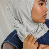 Model wearing Marble Grey Ruching Lite, showing soft ruching and wrinkle-free drape.