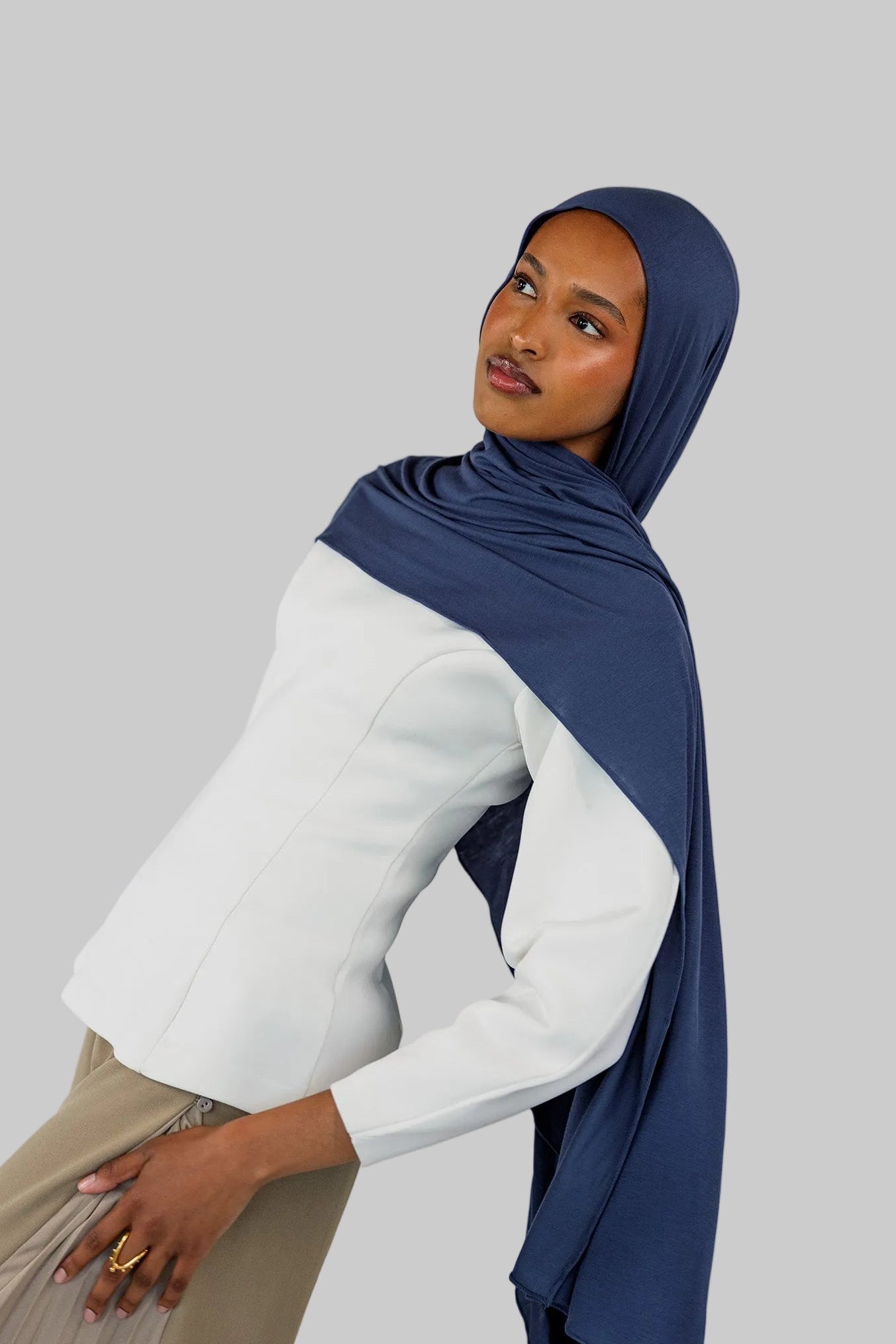Model wearing Twilight Blue Jersey Lite styled neatly, showing lightweight and wrinkle-free drape.