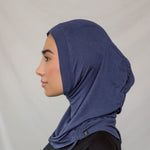Model wearing Twilight Blue Ruching Lite, showing soft ruching near the frame of the face.
