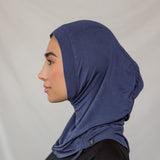 Model wearing Twilight Blue Ruching Lite, showing soft ruching near the frame of the face.