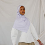  Model wearing Soft Amethyst Jersey Lite wrapped neatly, displaying its wrinkle-resistant, featherlight drape.