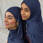 Mother and daughter models wearing Twilight Blue Jersey Lite, highlighting its washed blue tone under different lighting.
