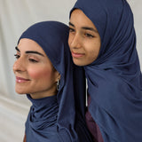 Mother and daughter models wearing Twilight Blue Jersey Lite, highlighting its washed blue tone under different lighting.
