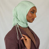 Stylized Sage Mist Ruching Lite hijab depicted on a model. 