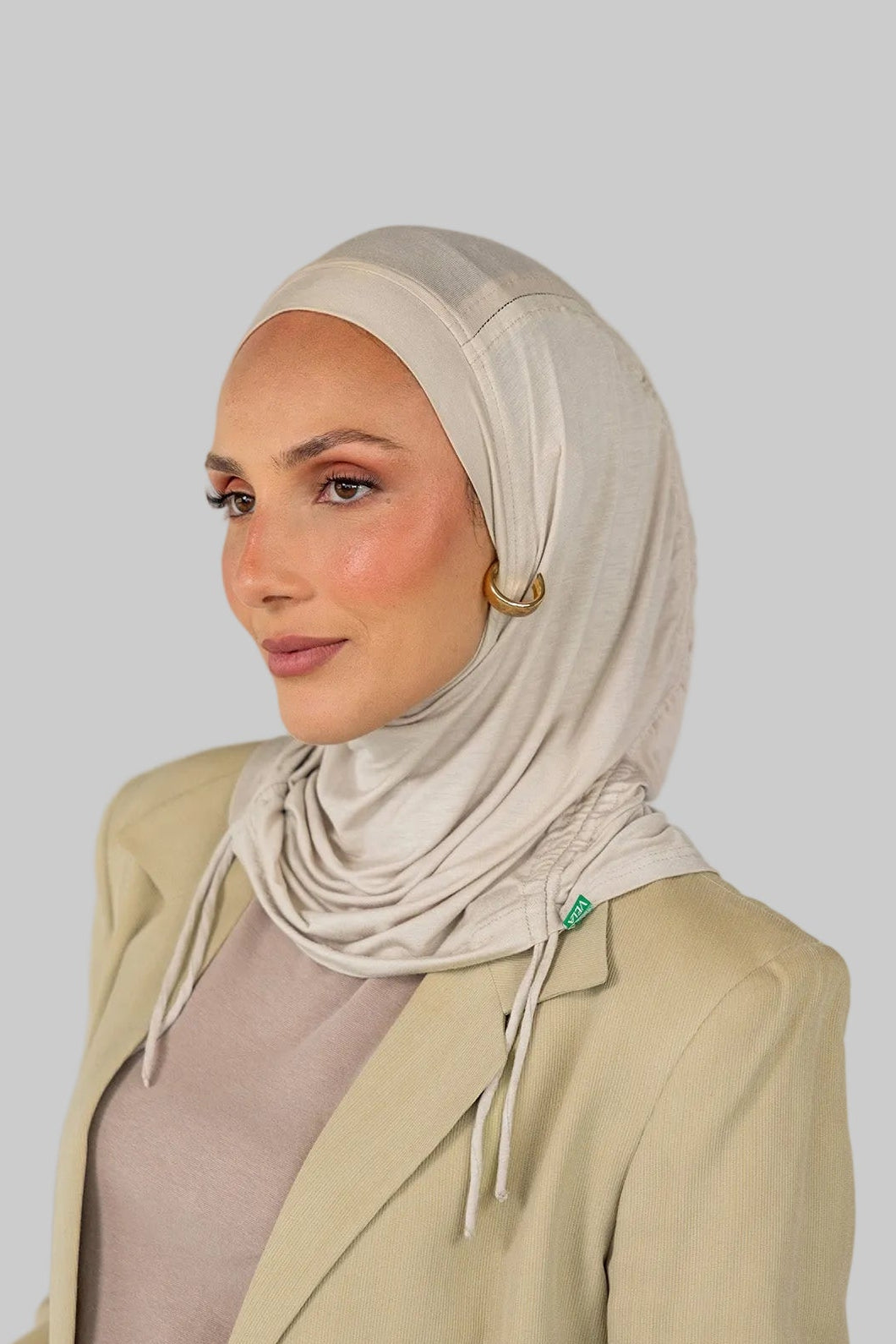 Model wearing Ashwood Ruching Lite with clean ruching, showing breathable and wrinkle-free finish.