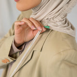 Model wearing Ashwood Ruching Lite, showcasing the neutral tone styled to show ruching detail.
