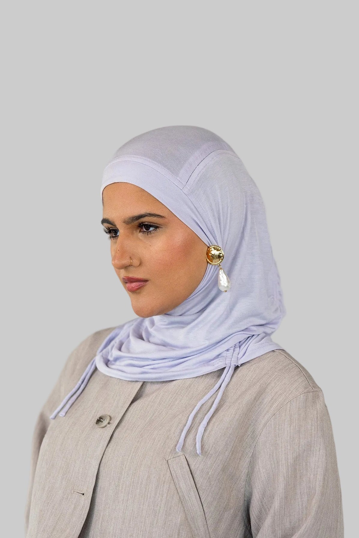 Model wearing Soft Amethyst Ruching Lite, highlighting its delicate ruching and featherlight fabric.