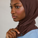 Model wearing Espresso Ruching Lite, highlighting rich brown hue and ruching texture.