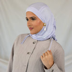 Model wearing Soft Amethyst Ruching Lite showing the soft material. 