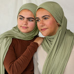 Sister models wearing Palm Desert Jersey Lite, styled with a casual drape to highlight breathable, lightweight feel.