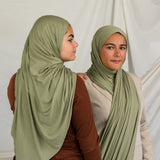 Two models wearing Palm Desert Jersey Lite, showcasing the earthy olive tone in different wrap styles.