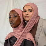 Two models wearing Terra Blush Jersey Lite showing versatility of the warm pink shade.