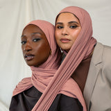Two models wearing Terra Blush Jersey Lite showing versatility of the warm pink shade.