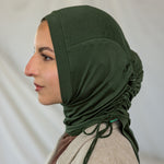 Model wearing Hunter Green Ruching Lite, highlighting ruching effect and deep green shade.