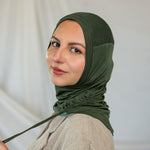 Model wearing Hunter Green Ruching Lite, highlighting the ruching ties. 
