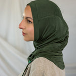 Model wearing Hunter Green Ruching Lite, highlighting ruching effect. 