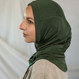 Model wearing Hunter Green Ruching Lite, highlighting ruching effect. 