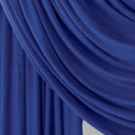 Ocean Blue Jersey Lite fabric draped in front of a white backdrop, revealing its bold indigo hue and featherlight jersey texture.