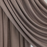  Truffle Mink Jersey Lite fabric draped in front of a white backdrop, revealing warm taupe-grey color and beyond-soft texture.