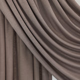  Truffle Mink Jersey Lite fabric draped in front of a white backdrop, revealing warm taupe-grey color and beyond-soft texture.