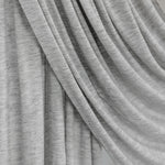 Marble Grey Jersey Lite fabric swatch against white backdrop, showing its cool-toned light grey color and smooth jersey finish.