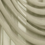 Close-up of draped sheer curtains in a light warm beige or cream tone, showing soft folds and translucent fabric texture.