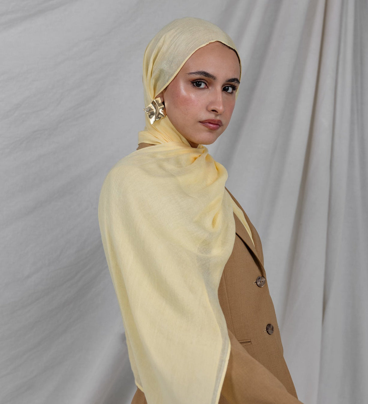 VELA hijab in Yuzu Pie, a citrus-inspired yellow that brings brightness and joy to every look.