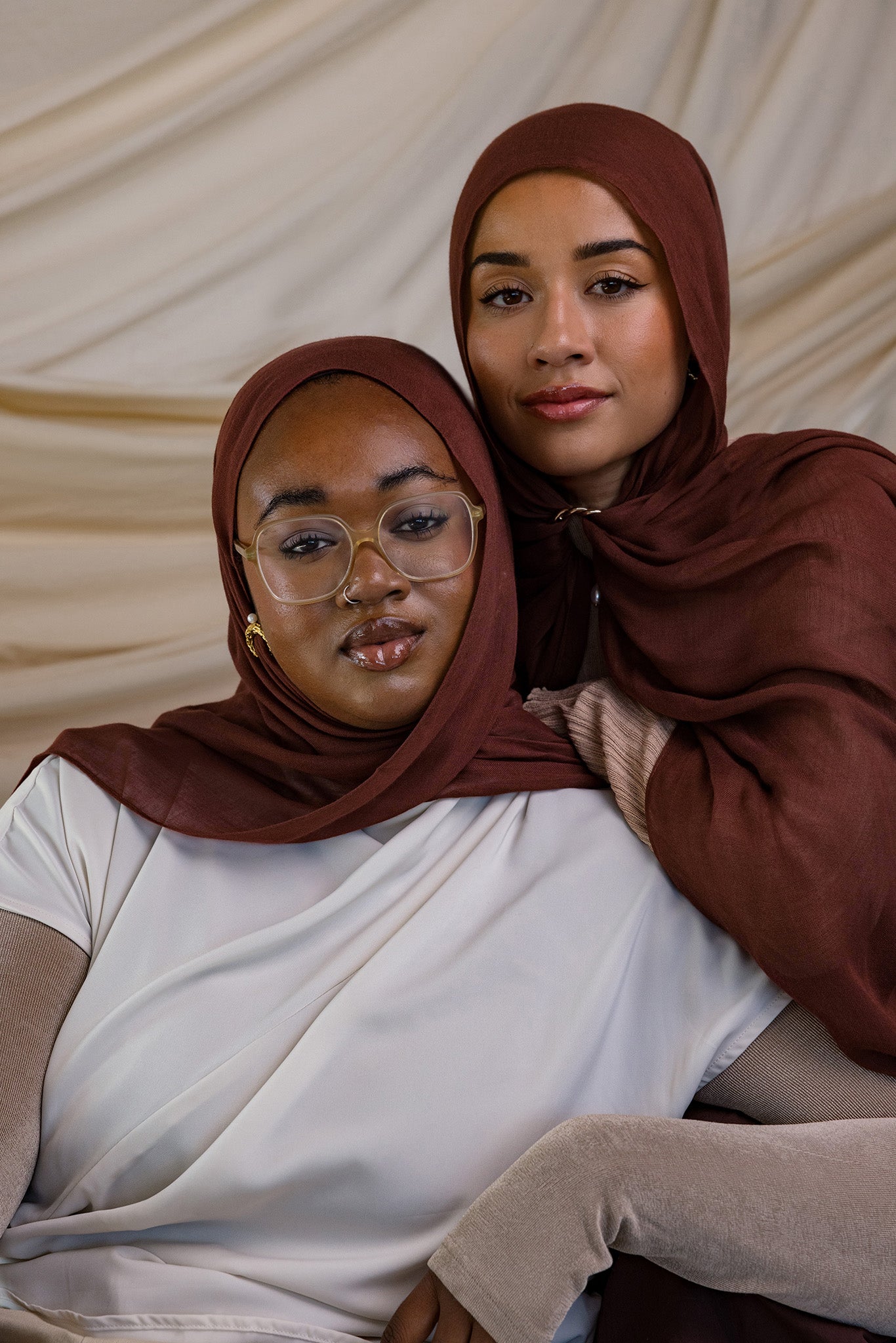 Two Models wearing breathable modal hijab inspired by natural spice tones and crafted in small batches.


