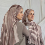 Two models wearing brown sediment printed hijabs