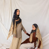Printed hijab inspired by Syrian handwoven patterns and traditional textile art.