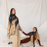 Lightweight hijab with a heritage-inspired print drawn from traditional cushion weaving.