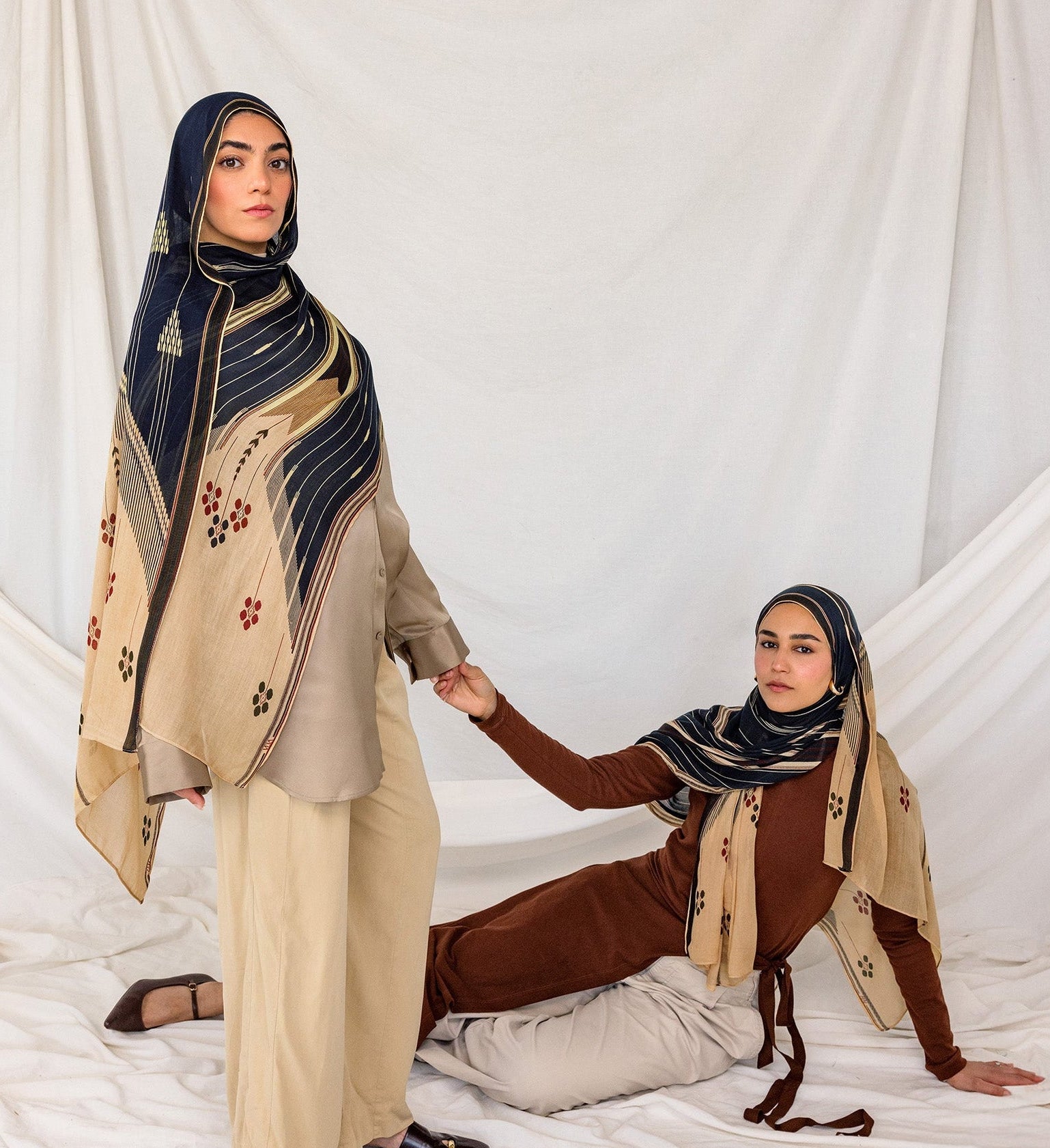 Lightweight hijab with a heritage-inspired print drawn from traditional cushion weaving.