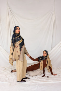 Lightweight hijab with a heritage-inspired print drawn from traditional cushion weaving.