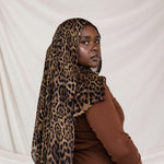 Model styled in a leopard print modal hijab.
