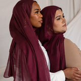 Models in angled poses wearing the Maroon hijab, showcasing different styling perspectives in coordinated outfits.